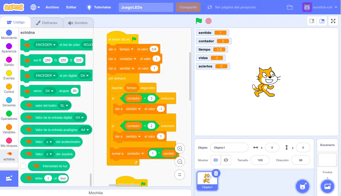 El entorno EchidnaScratch, con bloques de la placa y el gato de Scratch en el escenario.